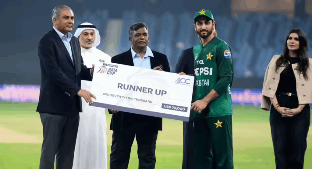 Salman Agha throws the runner-up cheque